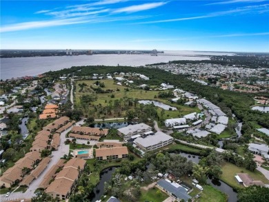 This first floor condo overlooks the tranquil waterway of Indian on Riverbend Golf and Country Club in Florida - for sale on GolfHomes.com, golf home, golf lot