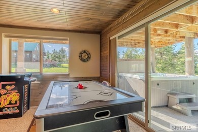 Modern Mountain Escape on the Golf Course! Experience mountain on Island Park Village Resort Golf Course in Idaho - for sale on GolfHomes.com, golf home, golf lot