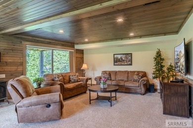 Modern Mountain Escape on the Golf Course! Experience mountain on Island Park Village Resort Golf Course in Idaho - for sale on GolfHomes.com, golf home, golf lot