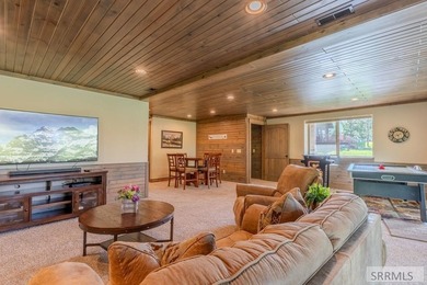 Modern Mountain Escape on the Golf Course! Experience mountain on Island Park Village Resort Golf Course in Idaho - for sale on GolfHomes.com, golf home, golf lot