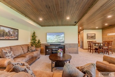Modern Mountain Escape on the Golf Course! Experience mountain on Island Park Village Resort Golf Course in Idaho - for sale on GolfHomes.com, golf home, golf lot