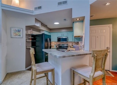 Welcome to low-maintenance living in the highly sought-after on Kiln Creek Golf and Country Club in Virginia - for sale on GolfHomes.com, golf home, golf lot
