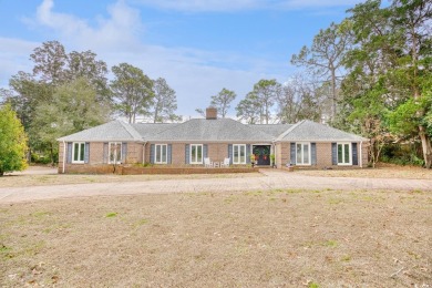 Check out this charming all brick home located in the sought on Pine Lakes Country Club in South Carolina - for sale on GolfHomes.com, golf home, golf lot