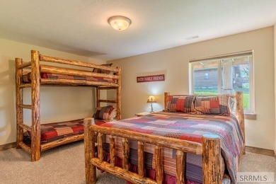 Modern Mountain Escape on the Golf Course! Experience mountain on Island Park Village Resort Golf Course in Idaho - for sale on GolfHomes.com, golf home, golf lot