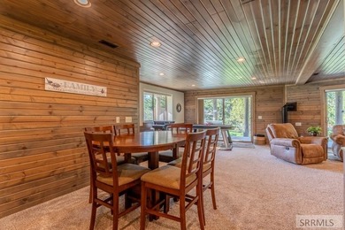 Modern Mountain Escape on the Golf Course! Experience mountain on Island Park Village Resort Golf Course in Idaho - for sale on GolfHomes.com, golf home, golf lot