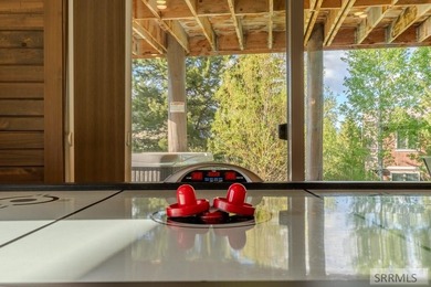 Modern Mountain Escape on the Golf Course! Experience mountain on Island Park Village Resort Golf Course in Idaho - for sale on GolfHomes.com, golf home, golf lot