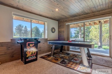 Modern Mountain Escape on the Golf Course! Experience mountain on Island Park Village Resort Golf Course in Idaho - for sale on GolfHomes.com, golf home, golf lot