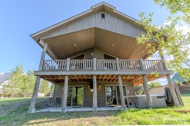 Modern Mountain Escape on the Golf Course! Experience mountain on Island Park Village Resort Golf Course in Idaho - for sale on GolfHomes.com, golf home, golf lot