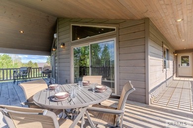 Modern Mountain Escape on the Golf Course! Experience mountain on Island Park Village Resort Golf Course in Idaho - for sale on GolfHomes.com, golf home, golf lot