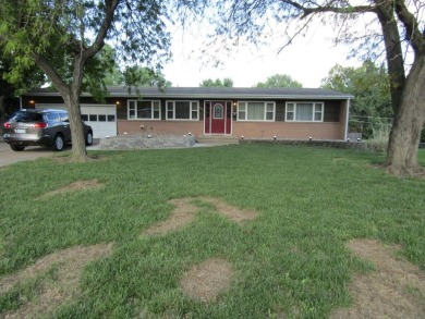 Wonderful ranch home within eyesight of Country Club golf course on Salina Country Club in Kansas - for sale on GolfHomes.com, golf home, golf lot