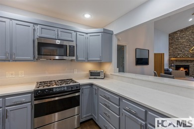 Nestled in Wildcat Cliffs Country Club, this lovely, comfortable on Wildcat Cliffs Country Club in North Carolina - for sale on GolfHomes.com, golf home, golf lot