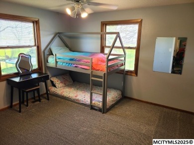 Great 3 bedroom, 1.5 bath split level home with an attached 2 on Linn Grove Country Club in Iowa - for sale on GolfHomes.com, golf home, golf lot