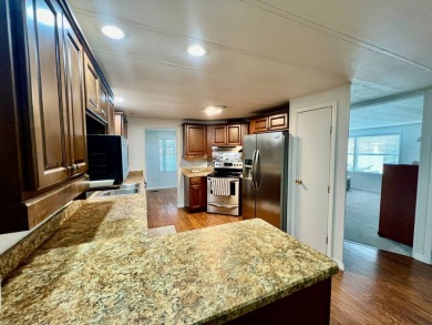 LAKEFRONT, SELLER IS VERY MOTIVATED, BRING ALL OFFERS! Home is on Water Oak Country Club Estates in Florida - for sale on GolfHomes.com, golf home, golf lot