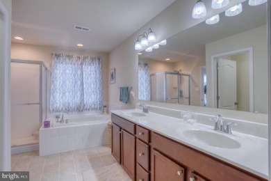 Looking for an end unit with a low-maintenance deck and an on Plantation Lakes Golf and Country Club in Delaware - for sale on GolfHomes.com, golf home, golf lot