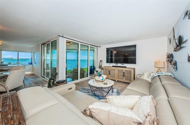 Enjoy spectacular views of Boca Ciega Bay from the moment you on Isla Del Sol Yacht and Country Club in Florida - for sale on GolfHomes.com, golf home, golf lot