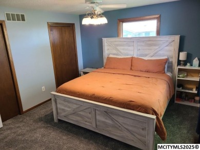 Great 3 bedroom, 1.5 bath split level home with an attached 2 on Linn Grove Country Club in Iowa - for sale on GolfHomes.com, golf home, golf lot