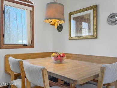 Set on a wooded corner parcel within the gated community of on Lords Valley Country Club, Inc in Pennsylvania - for sale on GolfHomes.com, golf home, golf lot