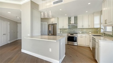 Perfectly positioned within the sought-after Grand Bay community on Longboat Key Golf Club Resort in Florida - for sale on GolfHomes.com, golf home, golf lot