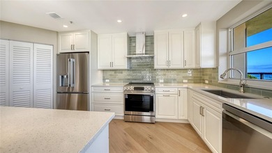 Perfectly positioned within the sought-after Grand Bay community on Longboat Key Golf Club Resort in Florida - for sale on GolfHomes.com, golf home, golf lot