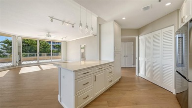 Perfectly positioned within the sought-after Grand Bay community on Longboat Key Golf Club Resort in Florida - for sale on GolfHomes.com, golf home, golf lot