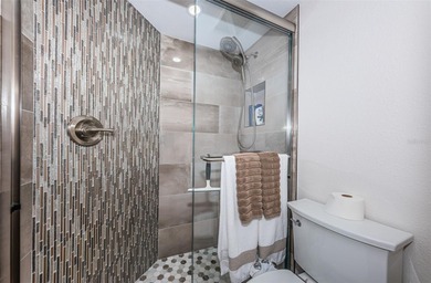 Enjoy spectacular views of Boca Ciega Bay from the moment you on Isla Del Sol Yacht and Country Club in Florida - for sale on GolfHomes.com, golf home, golf lot