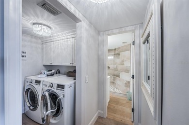 Enjoy spectacular views of Boca Ciega Bay from the moment you on Isla Del Sol Yacht and Country Club in Florida - for sale on GolfHomes.com, golf home, golf lot