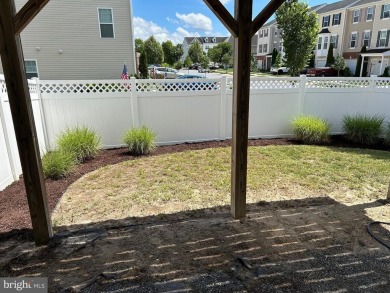 Looking for an end unit with a low-maintenance deck and an on Plantation Lakes Golf and Country Club in Delaware - for sale on GolfHomes.com, golf home, golf lot