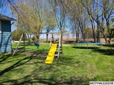 Great 3 bedroom, 1.5 bath split level home with an attached 2 on Linn Grove Country Club in Iowa - for sale on GolfHomes.com, golf home, golf lot