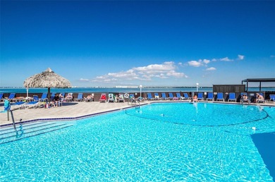 Enjoy spectacular views of Boca Ciega Bay from the moment you on Isla Del Sol Yacht and Country Club in Florida - for sale on GolfHomes.com, golf home, golf lot