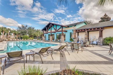 Life is better by the poolside! Wasting away again can be your on Arlington Ridge Golf Club in Florida - for sale on GolfHomes.com, golf home, golf lot