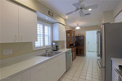 Beautifully Maintained Lakefront Home in Bonita Springs This on  in Florida - for sale on GolfHomes.com, golf home, golf lot