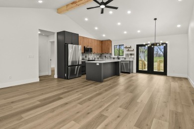 This stunning new home combines quality craftsmanship with on Bill and Payne Stewart Golf Course  in Missouri - for sale on GolfHomes.com, golf home, golf lot