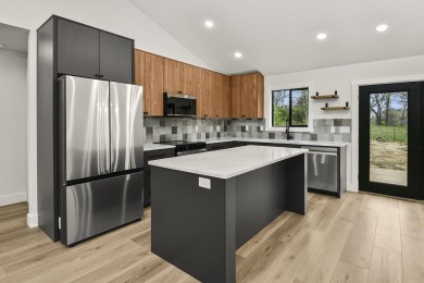 This stunning new home combines quality craftsmanship with on Bill and Payne Stewart Golf Course  in Missouri - for sale on GolfHomes.com, golf home, golf lot