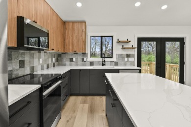 This stunning new home combines quality craftsmanship with on Bill and Payne Stewart Golf Course  in Missouri - for sale on GolfHomes.com, golf home, golf lot