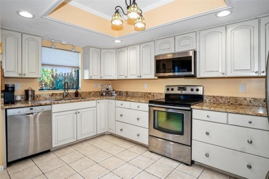 This home is situated in a quiet neighborhood in Sun City Center on Caloosa Greens Executive Golf Course in Florida - for sale on GolfHomes.com, golf home, golf lot