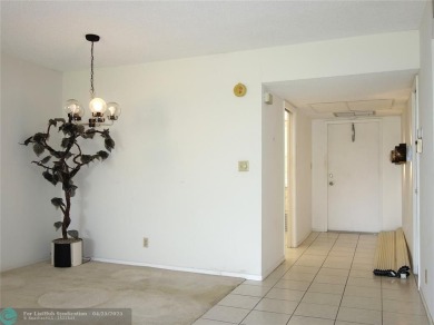 Spacious 2-Bed, 2-Bath Condo with Golf Course Views. Enjoy on Palm-Aire Country Club and Resort - Palms in Florida - for sale on GolfHomes.com, golf home, golf lot