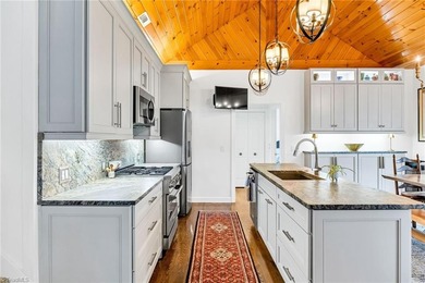 This spacious waterfront home in Jefferson Landing offers over 4 on Jefferson Landing Club in North Carolina - for sale on GolfHomes.com, golf home, golf lot