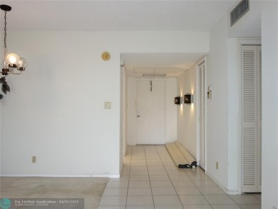 Spacious 2-Bed, 2-Bath Condo with Golf Course Views. Enjoy on Palm-Aire Country Club and Resort - Palms in Florida - for sale on GolfHomes.com, golf home, golf lot