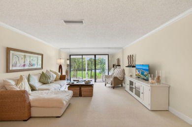 Discover this meticulously kept and beautifully furnished on Boca Lago Golf and Country Club in Florida - for sale on GolfHomes.com, golf home, golf lot