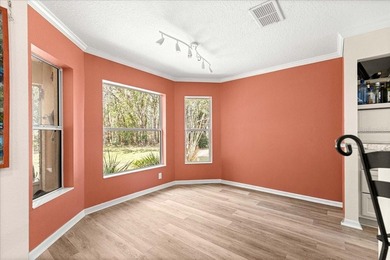 Discover the charm of living in the highly sought-after Avalon on On Top of the World Golf Course in Florida - for sale on GolfHomes.com, golf home, golf lot