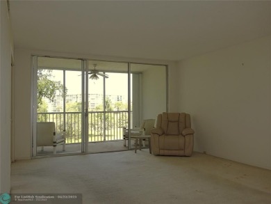 Spacious 2-Bed, 2-Bath Condo with Golf Course Views. Enjoy on Palm-Aire Country Club and Resort - Palms in Florida - for sale on GolfHomes.com, golf home, golf lot
