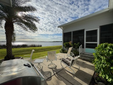 If you are looking for the perfect sanctuary in Central Florida on Lake Henry Golf Club in Florida - for sale on GolfHomes.com, golf home, golf lot