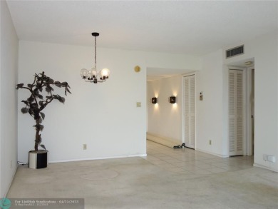Spacious 2-Bed, 2-Bath Condo with Golf Course Views. Enjoy on Palm-Aire Country Club and Resort - Palms in Florida - for sale on GolfHomes.com, golf home, golf lot
