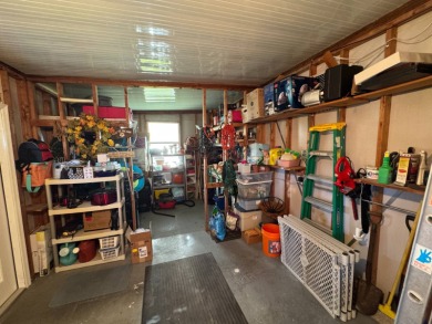 If you are looking for the perfect sanctuary in Central Florida on Lake Henry Golf Club in Florida - for sale on GolfHomes.com, golf home, golf lot