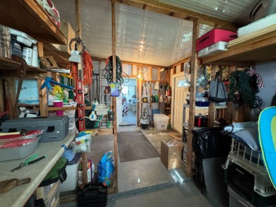 If you are looking for the perfect sanctuary in Central Florida on Lake Henry Golf Club in Florida - for sale on GolfHomes.com, golf home, golf lot
