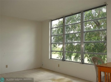 Spacious 2-Bed, 2-Bath Condo with Golf Course Views. Enjoy on Palm-Aire Country Club and Resort - Palms in Florida - for sale on GolfHomes.com, golf home, golf lot