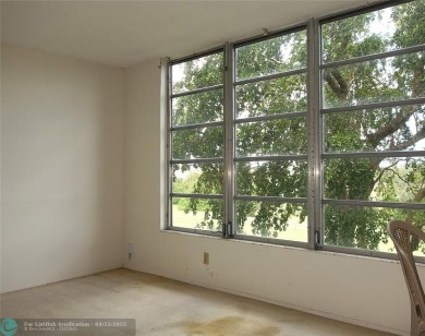 Spacious 2-Bed, 2-Bath Condo with Golf Course Views. Enjoy on Palm-Aire Country Club and Resort - Palms in Florida - for sale on GolfHomes.com, golf home, golf lot