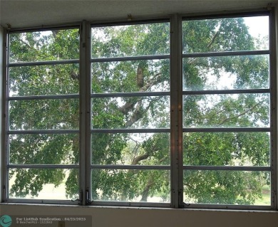 Spacious 2-Bed, 2-Bath Condo with Golf Course Views. Enjoy on Palm-Aire Country Club and Resort - Palms in Florida - for sale on GolfHomes.com, golf home, golf lot
