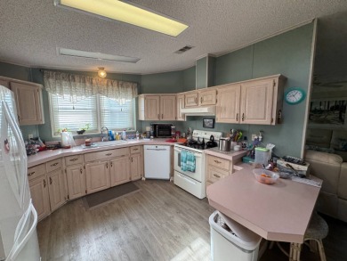 If you are looking for the perfect sanctuary in Central Florida on Lake Henry Golf Club in Florida - for sale on GolfHomes.com, golf home, golf lot