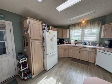 If you are looking for the perfect sanctuary in Central Florida on Lake Henry Golf Club in Florida - for sale on GolfHomes.com, golf home, golf lot